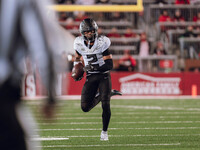 Oregon wide receiver Gary Bryant Jr. #2 runs the ball upfield after a catch against the Wisconsin Badgers at Camp Randall Stadium in Madison...