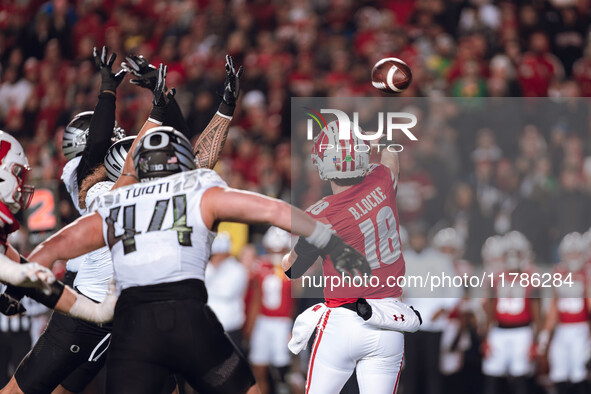 Wisconsin Badgers quarterback Braedyn Locke #18 attempts a pass against the Oregon Ducks at Camp Randall Stadium in Madison, Wisconsin, on N...