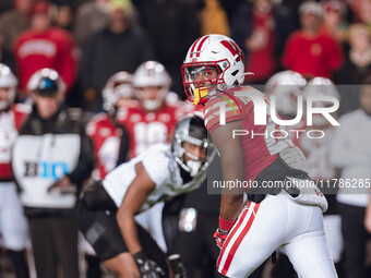 Wisconsin Badgers wide receiver Kyan Berry-Johnson #22 looks back to the line of scrimmage against the Oregon Ducks at Camp Randall Stadium...