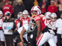 Wisconsin Badgers wide receiver Kyan Berry-Johnson #22 looks back to the line of scrimmage against the Oregon Ducks at Camp Randall Stadium...