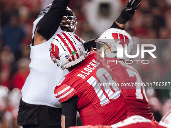 Wisconsin Badgers quarterback Braedyn Locke #18 attempts a pass against the Oregon Ducks at Camp Randall Stadium in Madison, Wisconsin, on N...