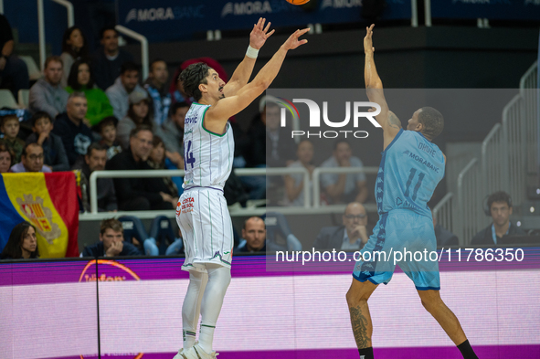 Players are in action during the Liga Endesa 2024-2025 match between Morabanc Andorra and Unicaja Malaga at Poliesportiu d'Andorra in Andorr...