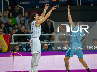 Players are in action during the Liga Endesa 2024-2025 match between Morabanc Andorra and Unicaja Malaga at Poliesportiu d'Andorra in Andorr...