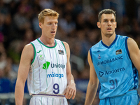 Alberto Diaz of Unicaja Malaga and Nikola Radicevic of Morabanc Andorra compete for the ball during the Liga Endesa 2024-2025 match between...