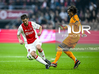 AFC Ajax Amsterdam legend Cristian Chivu and Real Madrid CF legend Christian Karembeu participate in the match between Ajax Legends and Real...