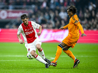 AFC Ajax Amsterdam legend Cristian Chivu and Real Madrid CF legend Christian Karembeu participate in the match between Ajax Legends and Real...