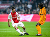 AFC Ajax Amsterdam legend Cristian Chivu and Real Madrid CF legend Christian Karembeu participate in the match between Ajax Legends and Real...