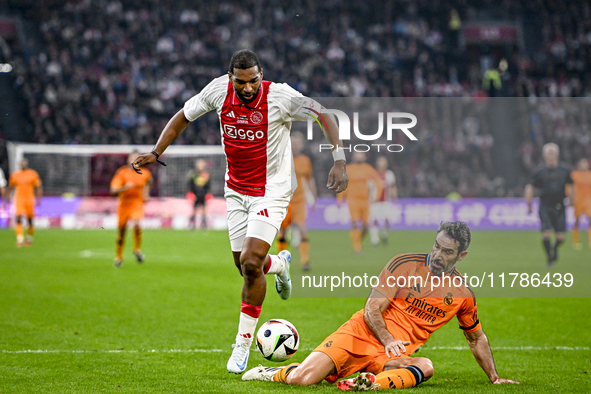 AFC Ajax Amsterdam legend Ryan Babel and Real Madrid CF legend Fernando Sanz participate in the match between Ajax Legends and Real Madrid L...