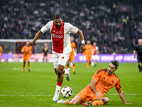 AFC Ajax Amsterdam legend Ryan Babel and Real Madrid CF legend Fernando Sanz participate in the match between Ajax Legends and Real Madrid L...