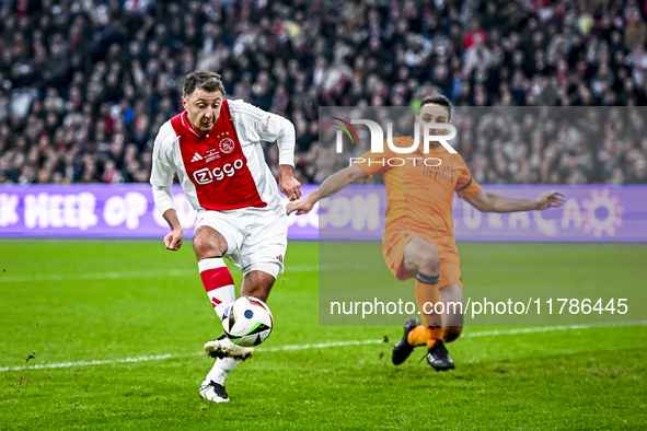 AFC Ajax Amsterdam legend Shota Arveladze scores the 1-0 during the match between Ajax Legends and Real Madrid Legends at the Johan Cruijff...