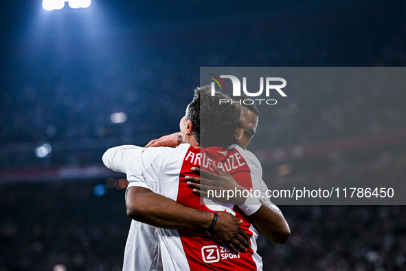 AFC Ajax Amsterdam legend players Shota Arveladze and Ryan Babel celebrate the 1-0 goal during the match between Ajax Legends and Real Madri...