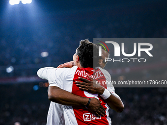 AFC Ajax Amsterdam legend players Shota Arveladze and Ryan Babel celebrate the 1-0 goal during the match between Ajax Legends and Real Madri...