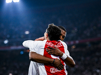 AFC Ajax Amsterdam legend players Shota Arveladze and Ryan Babel celebrate the 1-0 goal during the match between Ajax Legends and Real Madri...