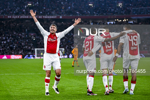 AFC Ajax Amsterdam legend players Shota Arveladze, Eyong Enoh, Ricardo van Rhijn, and Ryan Babel celebrate the 1-0 goal during the match bet...