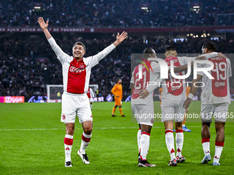 AFC Ajax Amsterdam legend players Shota Arveladze, Eyong Enoh, Ricardo van Rhijn, and Ryan Babel celebrate the 1-0 goal during the match bet...