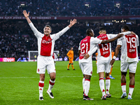 AFC Ajax Amsterdam legend players Shota Arveladze, Eyong Enoh, Ricardo van Rhijn, and Ryan Babel celebrate the 1-0 goal during the match bet...