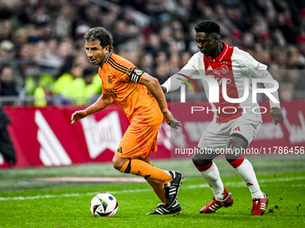 Real Madrid CF legend Luis Milla and AFC Ajax Amsterdam legend Clarence Seedorf participate in the match between Ajax Legends and Real Madri...