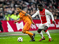 Real Madrid CF legend Luis Milla and AFC Ajax Amsterdam legend Clarence Seedorf participate in the match between Ajax Legends and Real Madri...