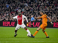 AFC Ajax Amsterdam legend Eyong Enoh and Real Madrid CF legend Jose Amavisca participate in the match between Ajax Legends and Real Madrid L...