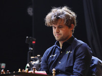 Norway's Magnus Carlsen plays on the last day of the 6th Tata Steel Chess India Rapid & Blitz Chess tournament in Kolkata, India, on Novembe...