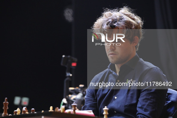 Norway's Magnus Carlsen plays on the last day of the 6th Tata Steel Chess India Rapid & Blitz Chess tournament in Kolkata, India, on Novembe...