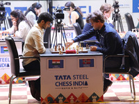 Norway's Magnus Carlsen plays against India's Vidit Gujrathi on the last day of the 6th Tata Steel Chess India Rapid & Blitz Chess tournamen...