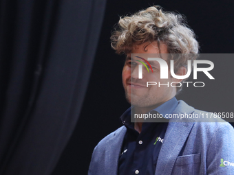 Norway's Magnus Carlsen gestures after winning the Tata Steel Chess India Tournament in Kolkata, India, on November 17, 2024. (