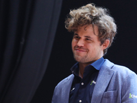 Norway's Magnus Carlsen gestures after winning the Tata Steel Chess India Tournament in Kolkata, India, on November 17, 2024. (