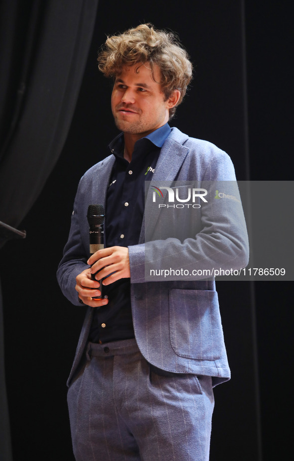 Norway's Magnus Carlsen gestures after winning the Tata Steel Chess India Tournament in Kolkata, India, on November 17, 2024. 