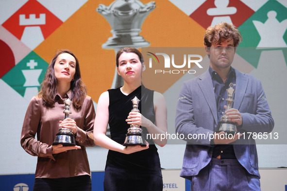 The Open Rapid and Blitz Chess winner Magnus Carlsen, women's blitz winner Kateryna Lagno, and women's rapid champion Aleksandra Goryachkina...