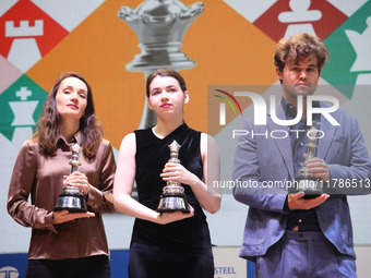 The Open Rapid and Blitz Chess winner Magnus Carlsen, women's blitz winner Kateryna Lagno, and women's rapid champion Aleksandra Goryachkina...