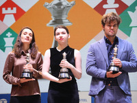 The Open Rapid and Blitz Chess winner Magnus Carlsen, women's blitz winner Kateryna Lagno, and women's rapid champion Aleksandra Goryachkina...