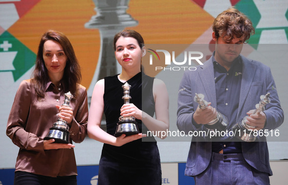 The Open Rapid and Blitz Chess winner Magnus Carlsen, women's blitz winner Kateryna Lagno, and women's rapid champion Aleksandra Goryachkina...