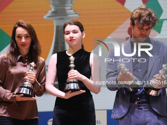 The Open Rapid and Blitz Chess winner Magnus Carlsen, women's blitz winner Kateryna Lagno, and women's rapid champion Aleksandra Goryachkina...