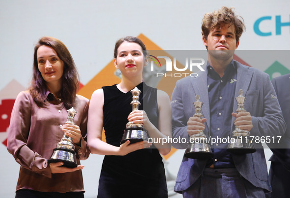 The Open Rapid and Blitz Chess winner Magnus Carlsen, women's blitz winner Kateryna Lagno, and women's rapid champion Aleksandra Goryachkina...