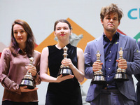 The Open Rapid and Blitz Chess winner Magnus Carlsen, women's blitz winner Kateryna Lagno, and women's rapid champion Aleksandra Goryachkina...