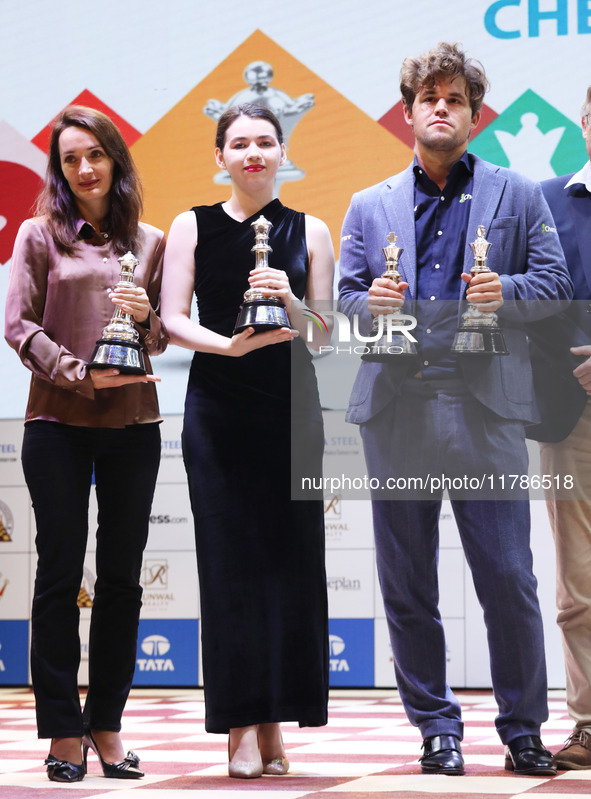 The Open Rapid and Blitz Chess winner Magnus Carlsen, women's blitz winner Kateryna Lagno, and women's rapid champion Aleksandra Goryachkina...