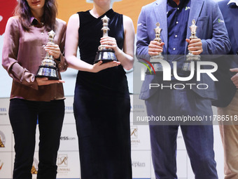 The Open Rapid and Blitz Chess winner Magnus Carlsen, women's blitz winner Kateryna Lagno, and women's rapid champion Aleksandra Goryachkina...