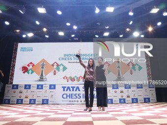 Women's blitz winner, Russian Kateryna Lagno, and women's rapid champion, Russian Aleksandra Goryachkina, pose for a picture with their trop...