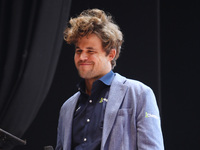 Norway's Magnus Carlsen gestures after winning the Tata Steel Chess India Tournament in Kolkata, India, on November 17, 2024. (