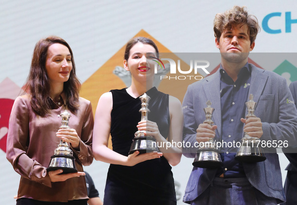 The Open Rapid and Blitz Chess winner Magnus Carlsen, women's blitz winner Kateryna Lagno, and women's rapid champion Aleksandra Goryachkina...