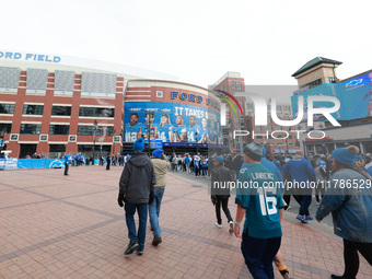 DETROIT,MICHIGAN-November 17: Fans arrive at Ford Field prior to the NFL football game between the Jacksonville Jaguars and the Detroit Lion...