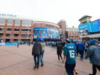 DETROIT,MICHIGAN-November 17: Fans arrive at Ford Field prior to the NFL football game between the Jacksonville Jaguars and the Detroit Lion...