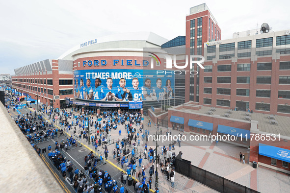 DETROIT,MICHIGAN-November 17: Fans arrive at Ford Field prior to the NFL football game between the Jacksonville Jaguars and the Detroit Lion...