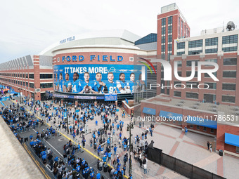 DETROIT,MICHIGAN-November 17: Fans arrive at Ford Field prior to the NFL football game between the Jacksonville Jaguars and the Detroit Lion...