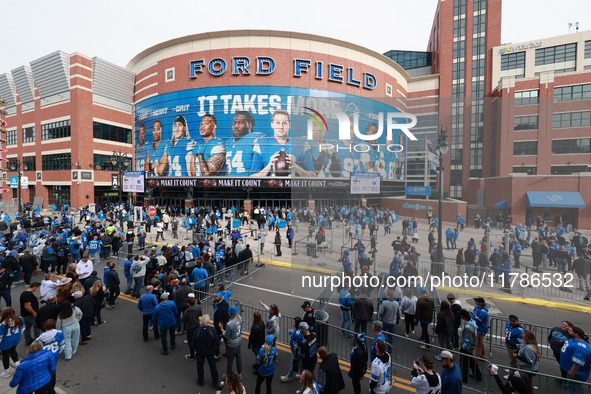 DETROIT,MICHIGAN-November 17: Fans arrive at Ford Field prior to the NFL football game between the Jacksonville Jaguars and the Detroit Lion...