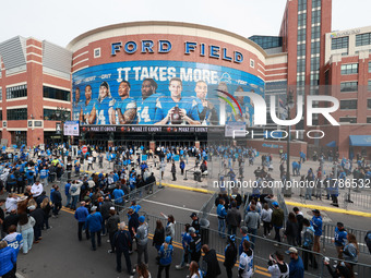 DETROIT,MICHIGAN-November 17: Fans arrive at Ford Field prior to the NFL football game between the Jacksonville Jaguars and the Detroit Lion...