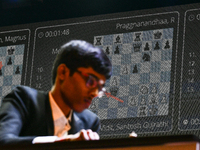 Indian GM R Praggnanandhaa plays chess during the 6th TATA Steel Chess India Tournament at Dhono Dhanyo Auditorium in Kolkata, India, on Nov...