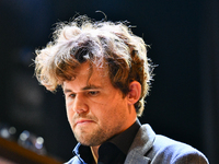 Norwegian GM Magnus Carlsen plays chess during the 6th TATA Steel Chess India Tournament at Dhono Dhanyo Auditorium in Kolkata, India, on No...