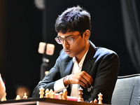 Indian GM R Praggnanandhaa plays chess during the 6th TATA Steel Chess India Tournament at Dhono Dhanyo Auditorium in Kolkata, India, on Nov...